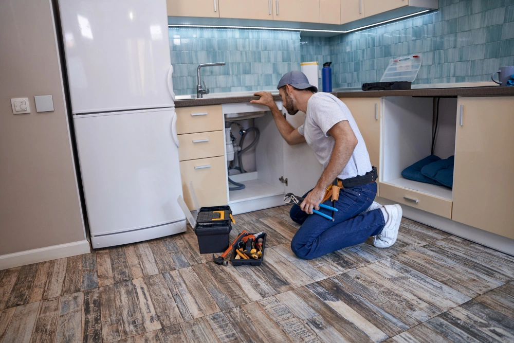 Installing kitchen base cabinets by Dallas Cabinets KB professional